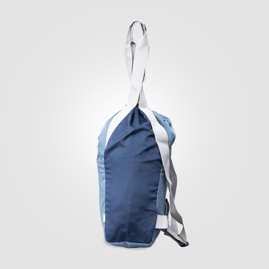 Blue and gray bag with a strap on a light gray background